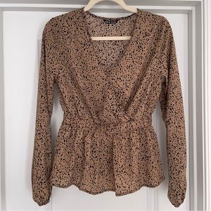 Brown and black speckled top